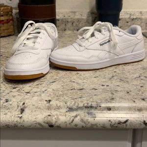 Classic white Reebok’s. Size 6. Worn once.